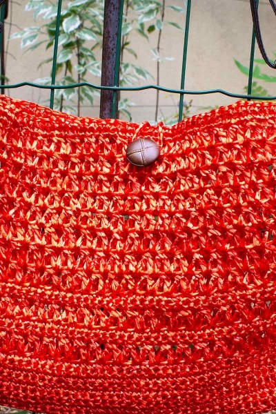 Red crochet handbag