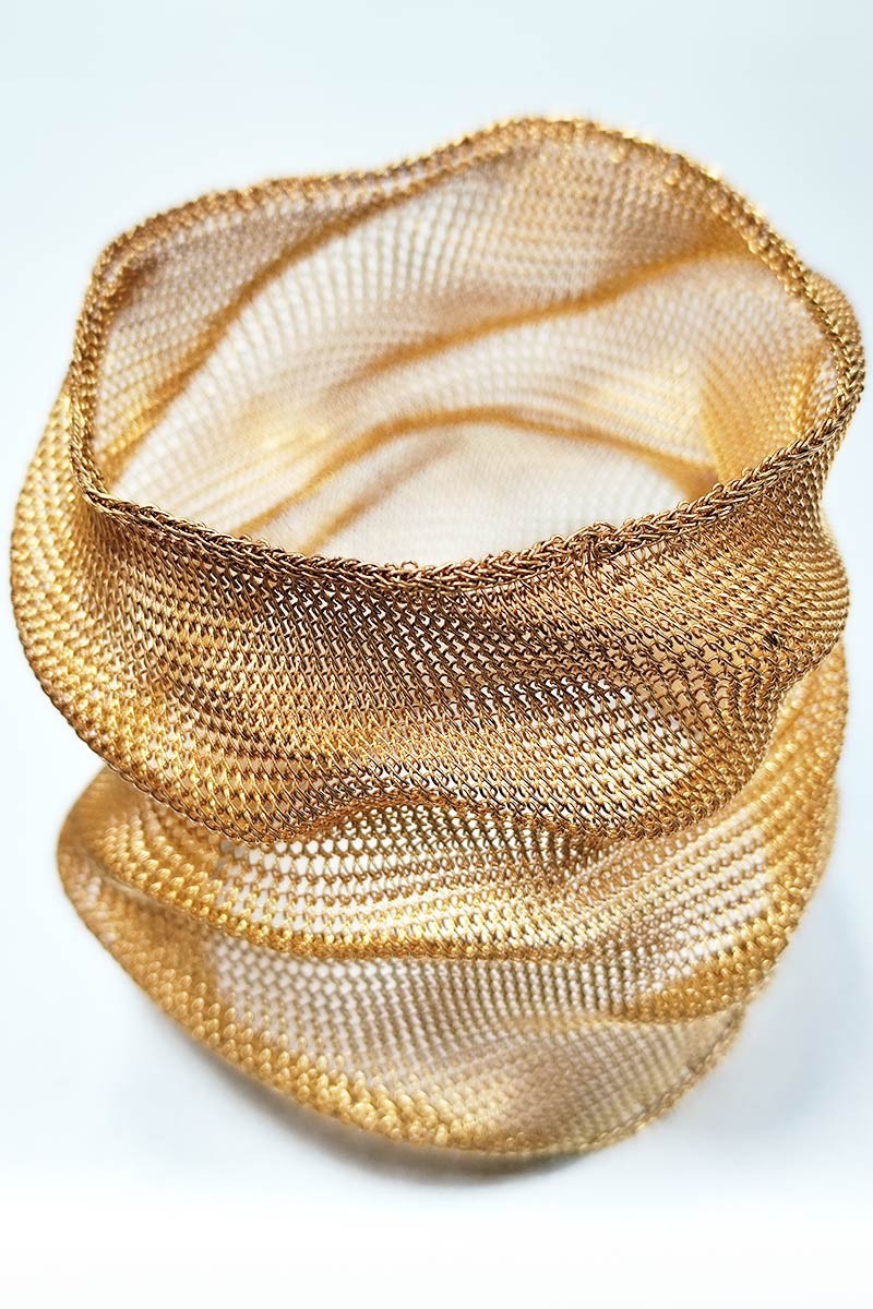 Crumpled metal mesh cuff