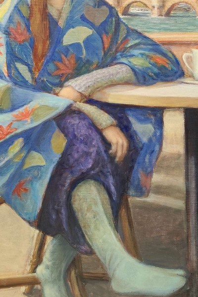 Young woman at the Café in a blue Kimono