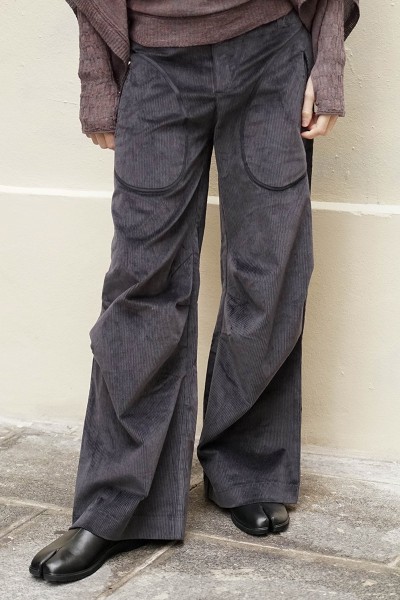 Pantalon velours à plis aux genoux